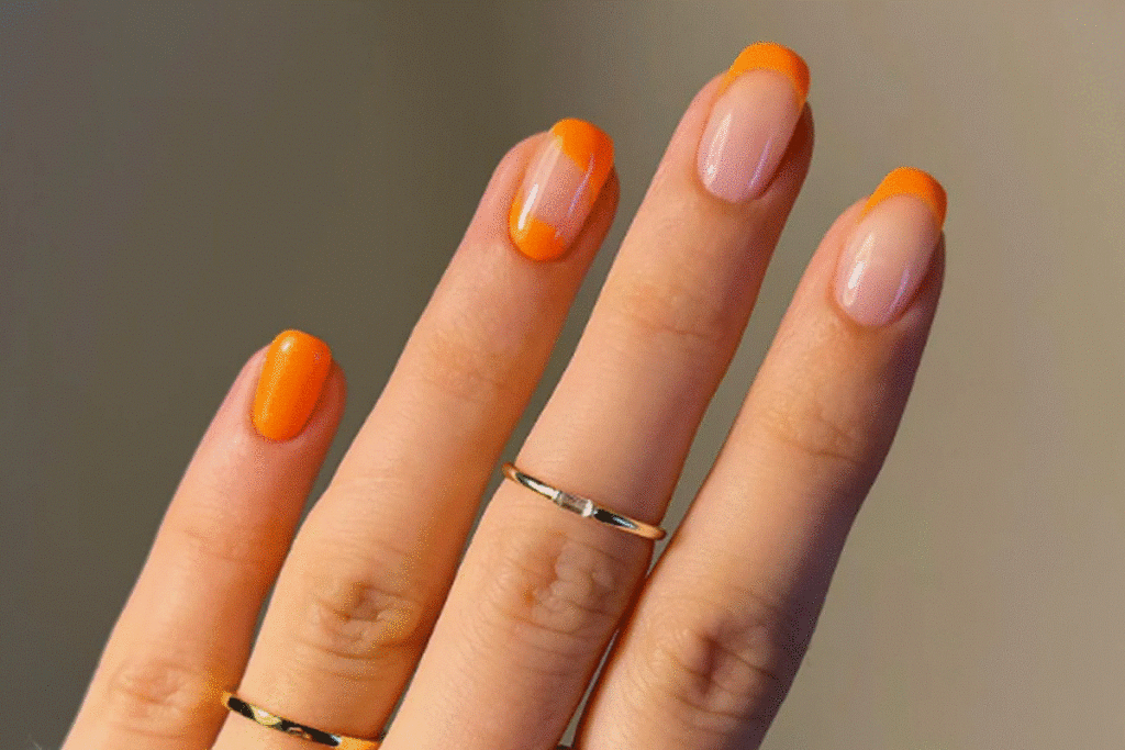 gelnägel in orange farbe süß und individuell